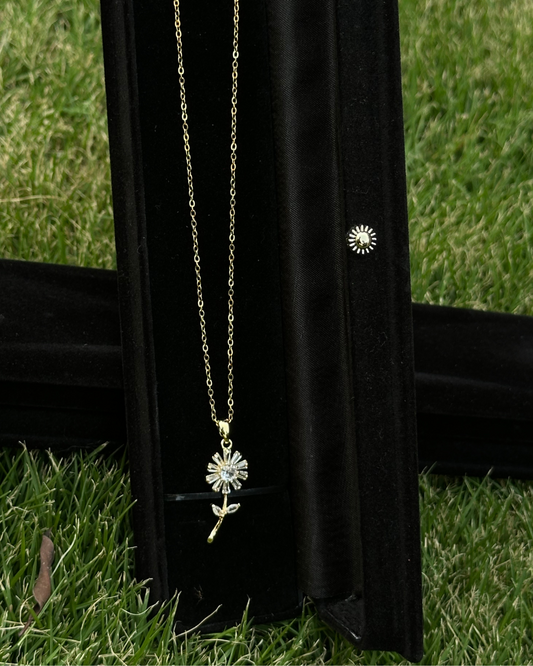Gold Daisy Pendant Necklace with Clear Gemstone Accents